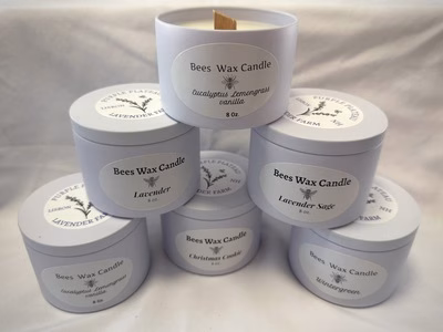 Candles stacked in a triangle display